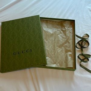 Gucci W:12” x L:16” x D: 2” gift box and 80” ribbon